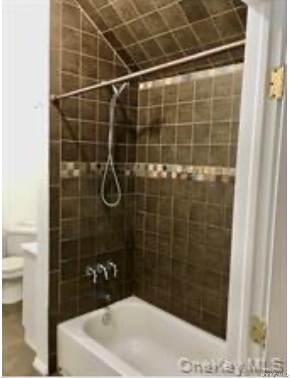13 Spring Street, Unit 2A Warwick, NY 10990 - Photo 15 of 20 a bathroom with a shower