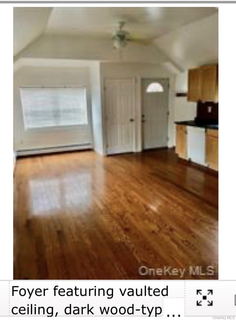 13 Spring Street, Unit 2A Warwick, NY 10990 - Photo 20 of 20 a view of an empty room with kitchen and a window