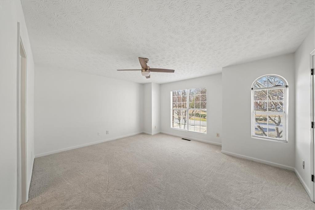 2814 Norfair Loop Lithonia, GA 30038 - Photo 10 of 18 a view of an empty room with a window