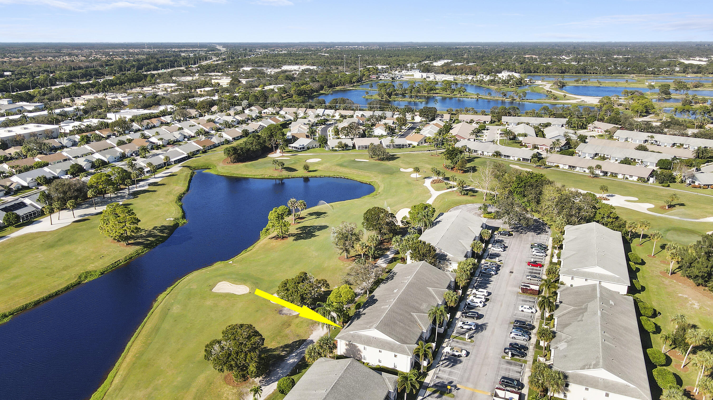 1112 Keystone Drive, Unit A Jupiter, FL 33458 - Photo 29 of 41 an aerial view of residential houses with outdoor space