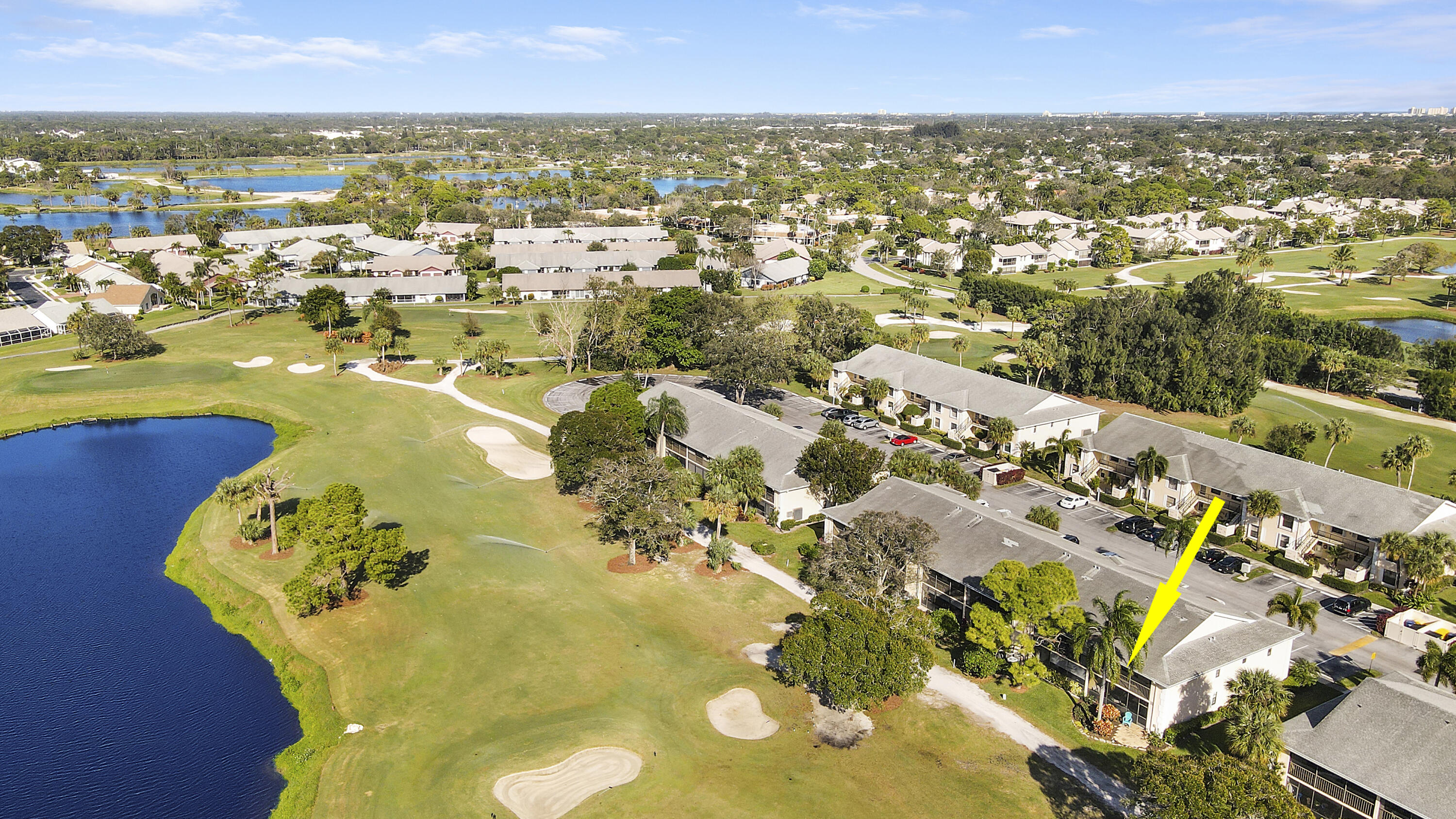 1112 Keystone Drive, Unit A Jupiter, FL 33458 - Photo 30 of 41 an aerial view of residential houses with outdoor space