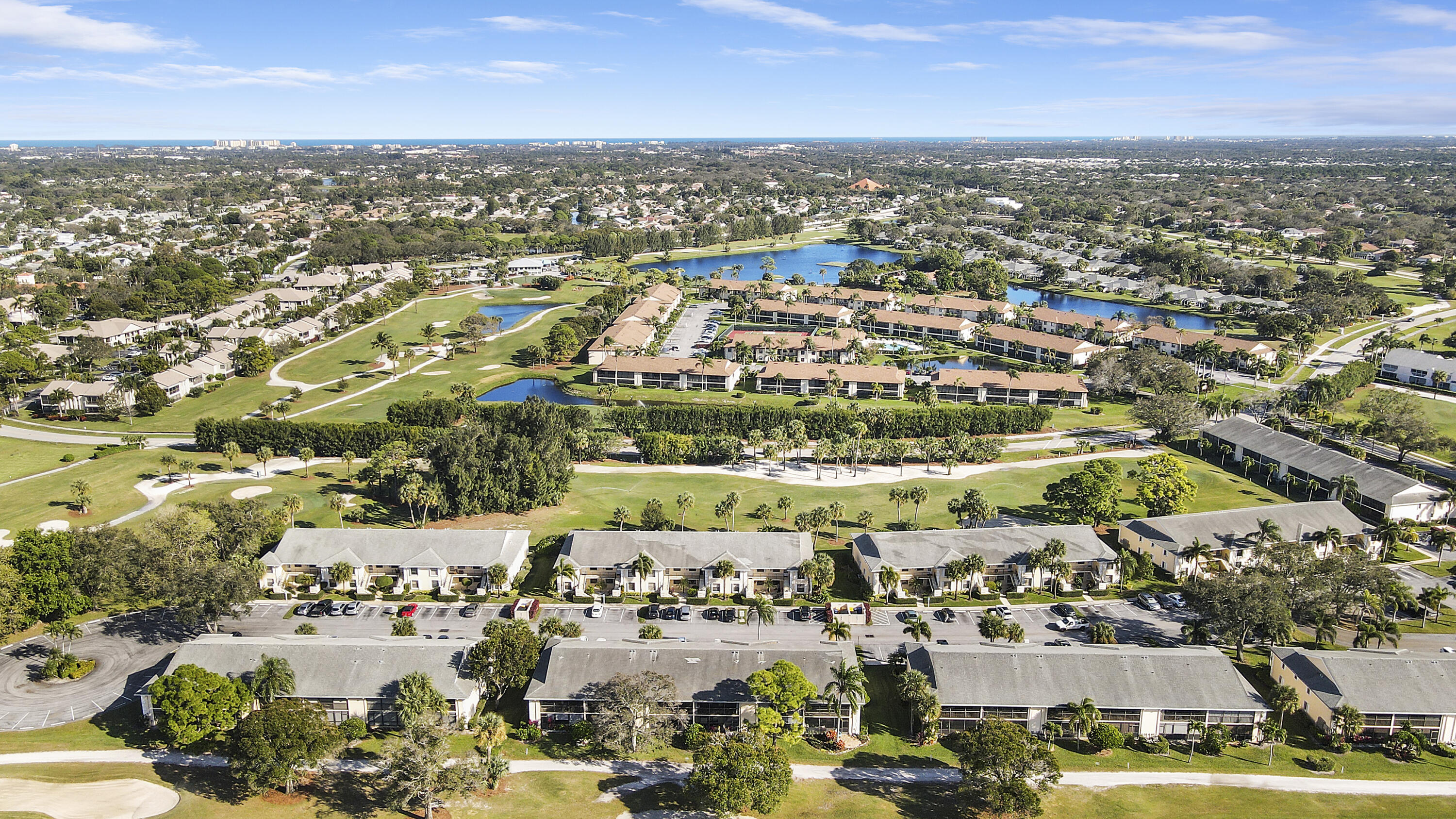 1112 Keystone Drive, Unit A Jupiter, FL 33458 - Photo 31 of 41 an aerial view of a city with lots of residential buildings