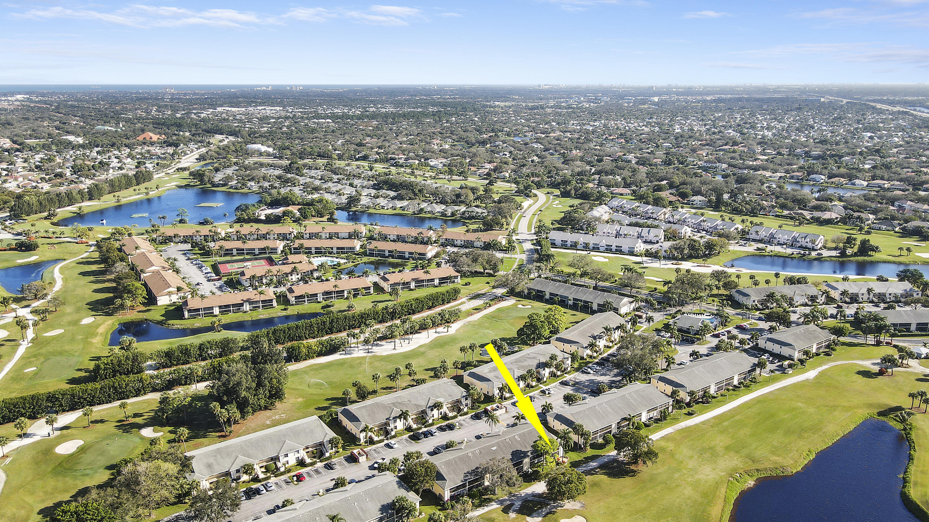 1112 Keystone Drive, Unit A Jupiter, FL 33458 - Photo 36 of 41 an aerial view of residential houses with outdoor space