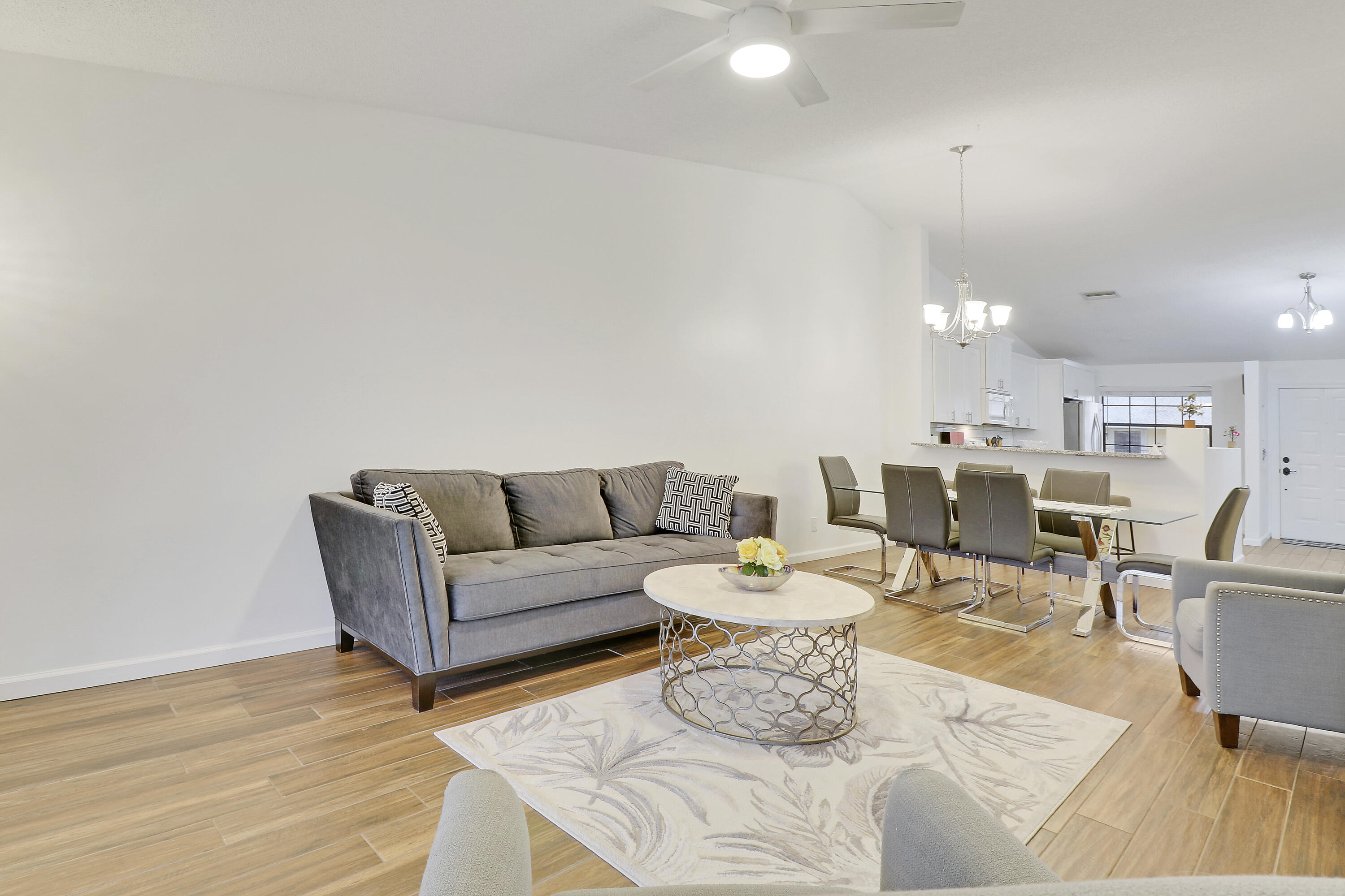 1112 Keystone Drive, Unit A Jupiter, FL 33458 - Photo 7 of 41 a living room with furniture
