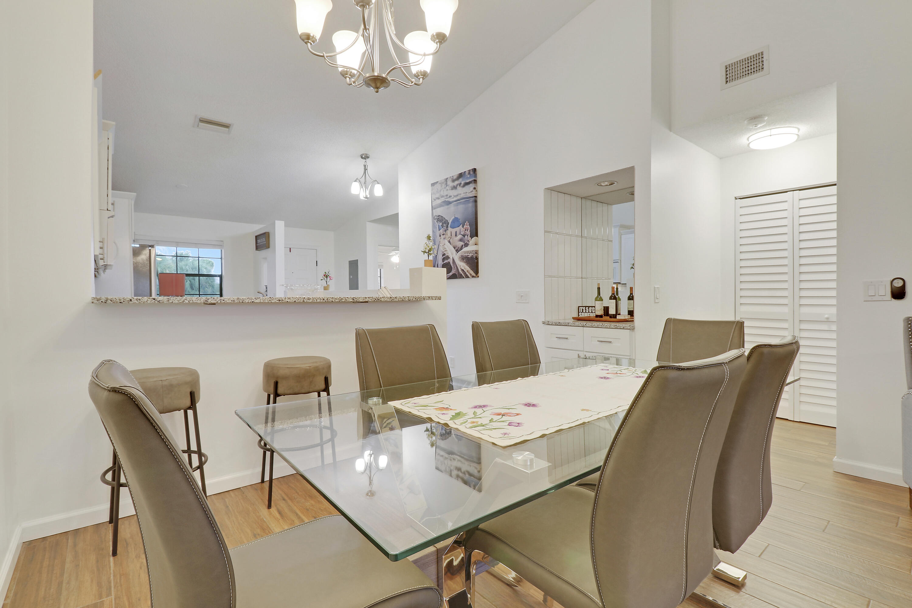 1112 Keystone Drive, Unit A Jupiter, FL 33458 - Photo 8 of 41 a view of a dining room with furniture
