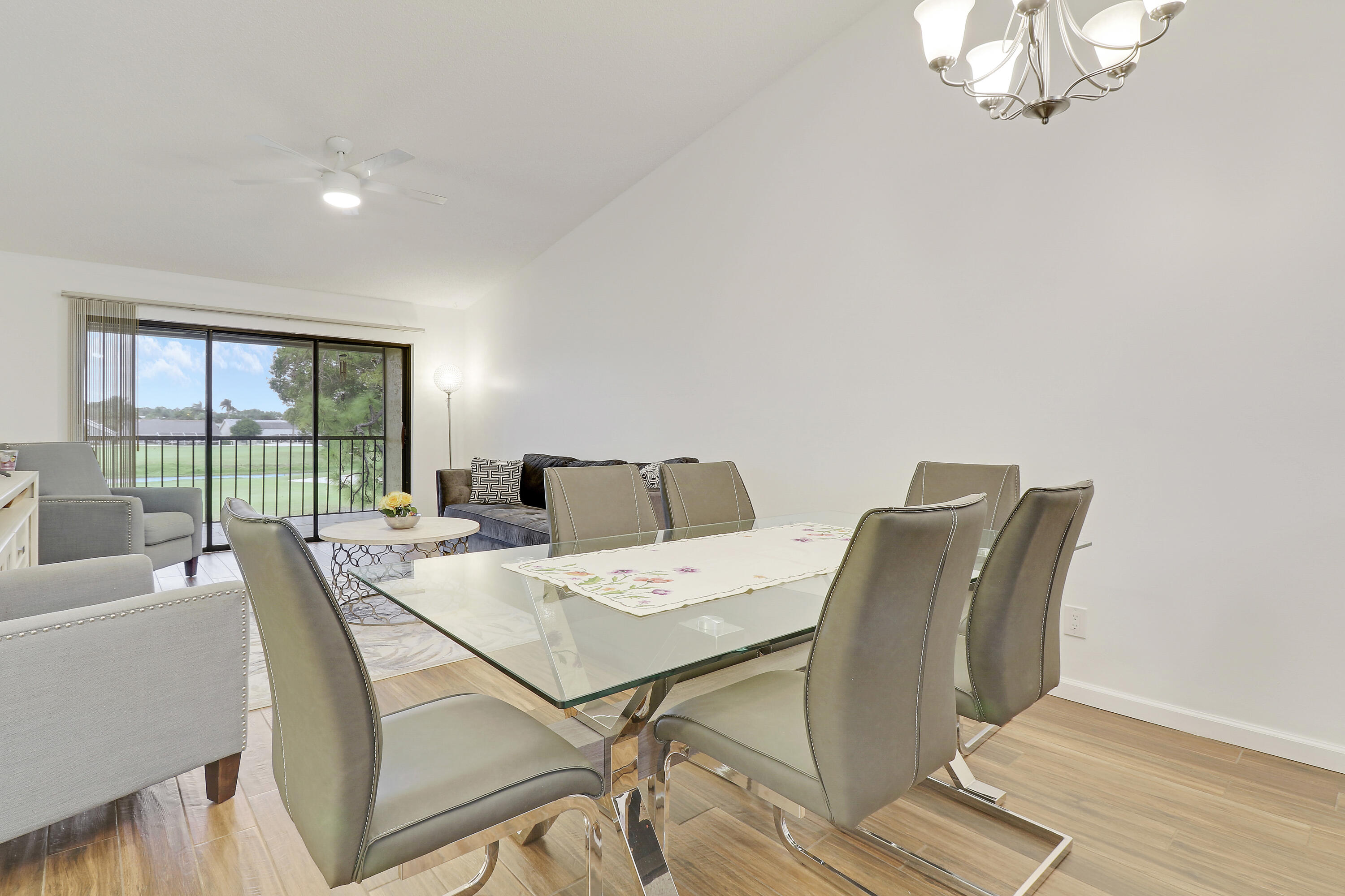 1112 Keystone Drive, Unit A Jupiter, FL 33458 - Photo 10 of 41 a view of a dining room with furniture window and outside view