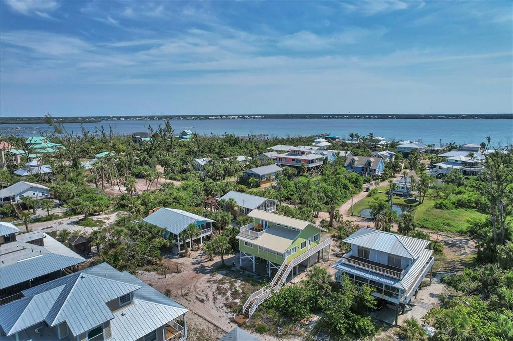 9350 Little Gasparilla Boca Grande, FL 33921 - Photo 11 of 46 an aerial view of a house with a garden