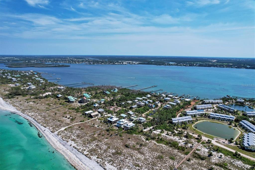 9350 Little Gasparilla Boca Grande, FL 33921 - Photo 14 of 46 a view of a lake with a city