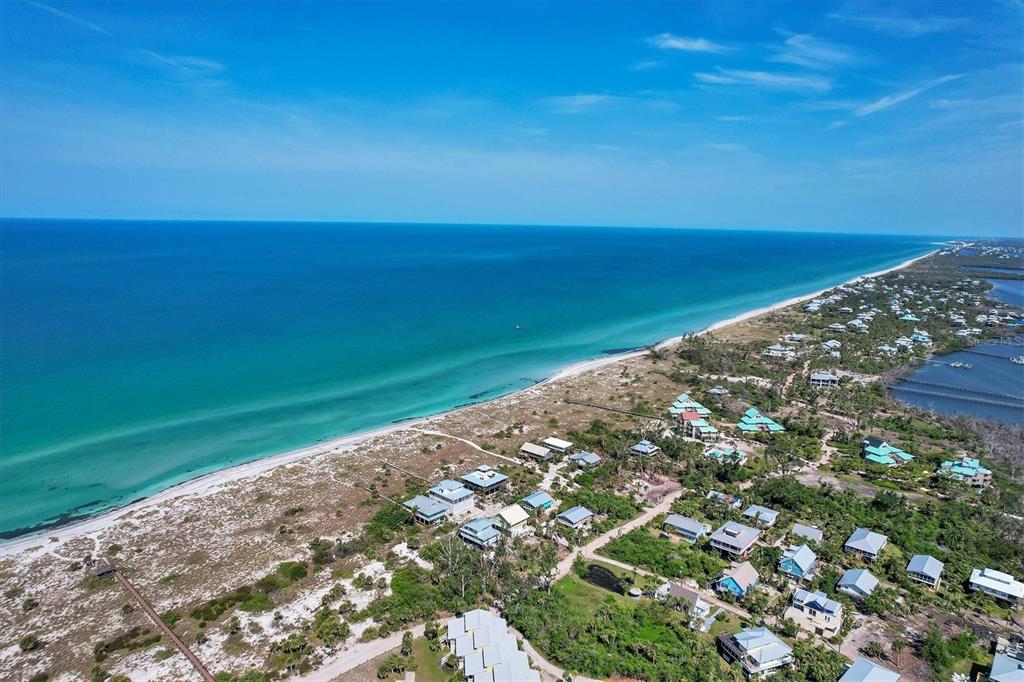 9350 Little Gasparilla Boca Grande, FL 33921 - Photo 16 of 46 a view of an ocean and a mountain