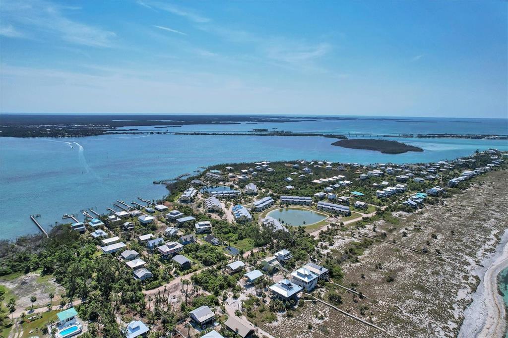 9350 Little Gasparilla Boca Grande, FL 33921 - Photo 19 of 46 a view of a lake with a city