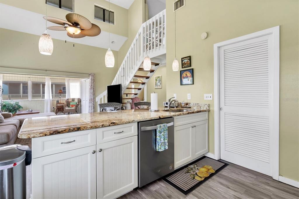 9350 Little Gasparilla Boca Grande, FL 33921 - Photo 27 of 46 a spacious bathroom with a granite countertop sink and a mirror