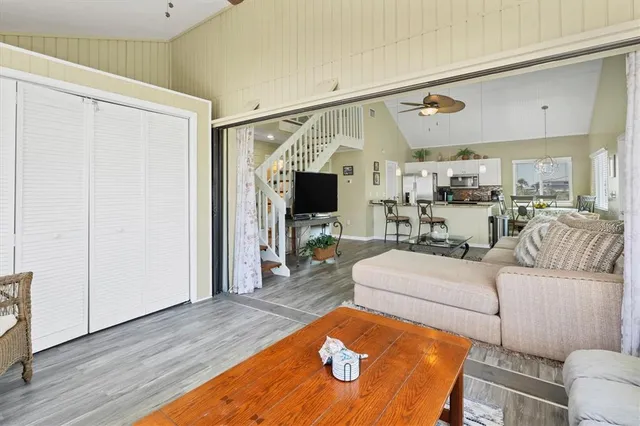 a living room with furniture and a window