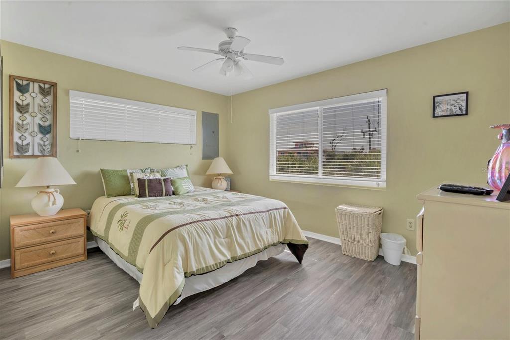 9350 Little Gasparilla Boca Grande, FL 33921 - Photo 31 of 46 a bedroom with a bed and a window