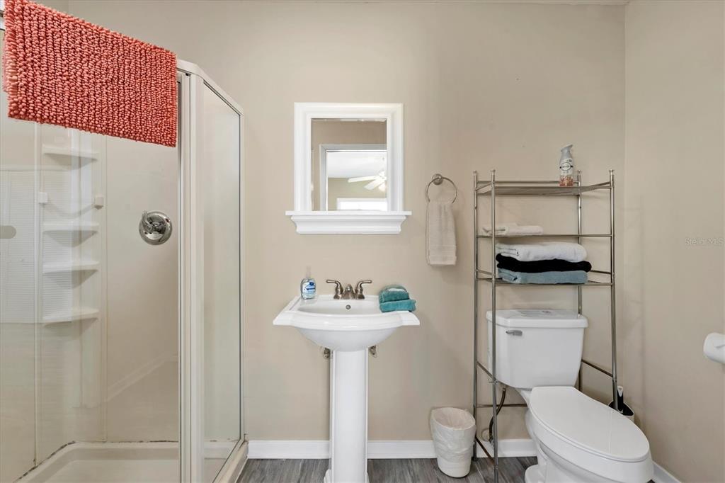 9350 Little Gasparilla Boca Grande, FL 33921 - Photo 34 of 46 a bathroom with a sink toilet and a mirror