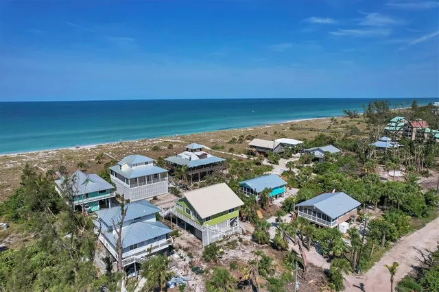 a view of a city with an ocean