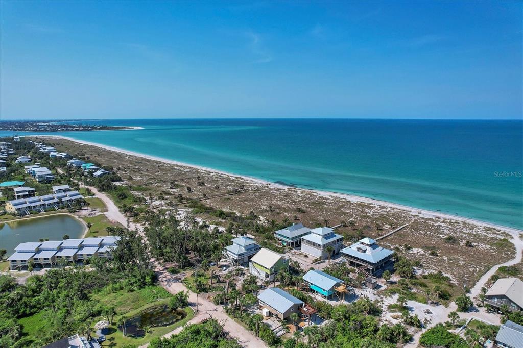 9350 Little Gasparilla Boca Grande, FL 33921 - Photo 46 of 46 an aerial view of ocean and residential houses with outdoor space