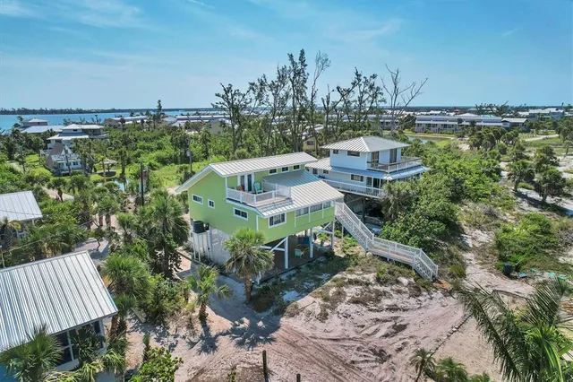 a view of a balcony with chairs