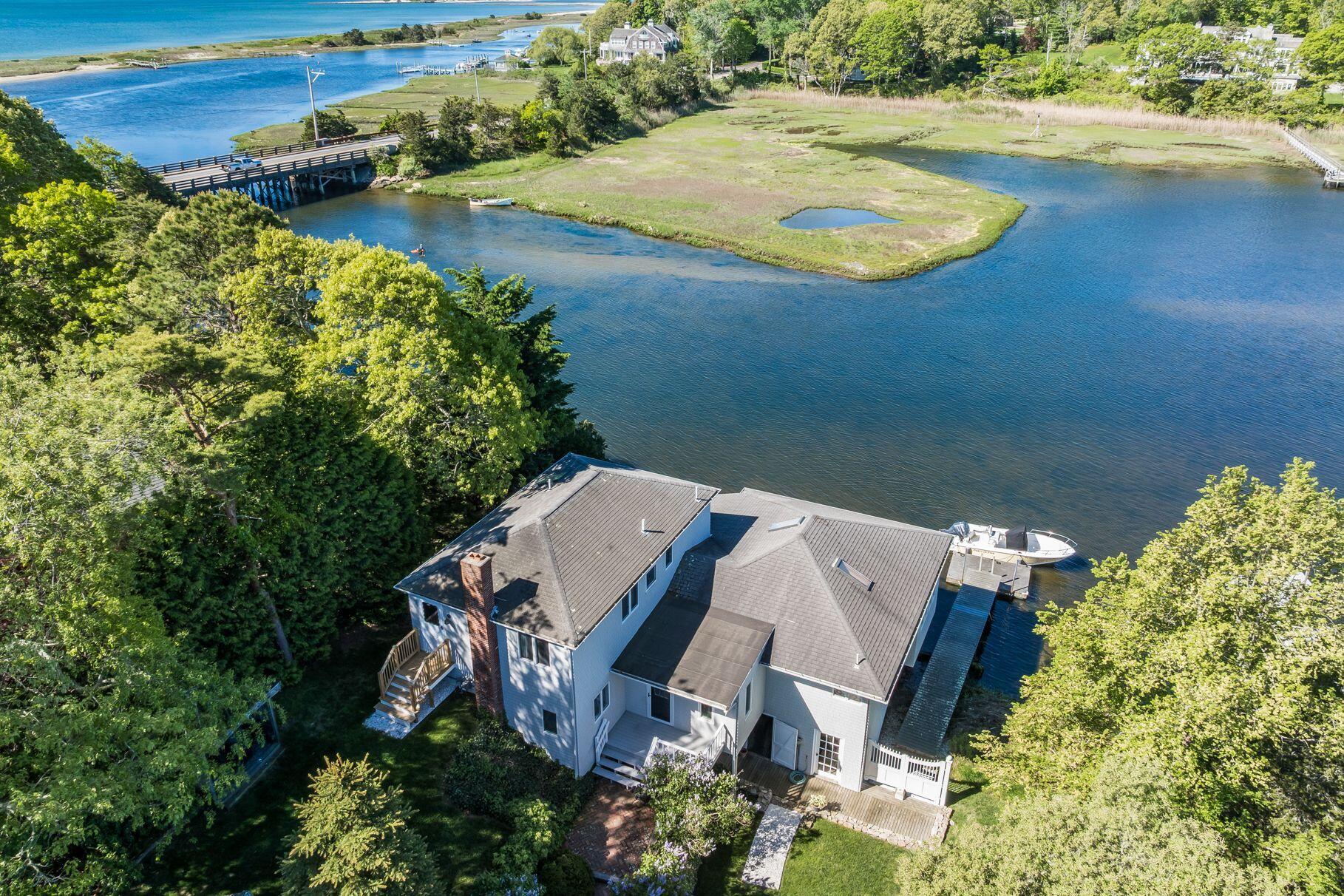 818 South Main Street Centerville, MA 02632 - Photo 3 of 50 an aerial view of a house with outdoor space