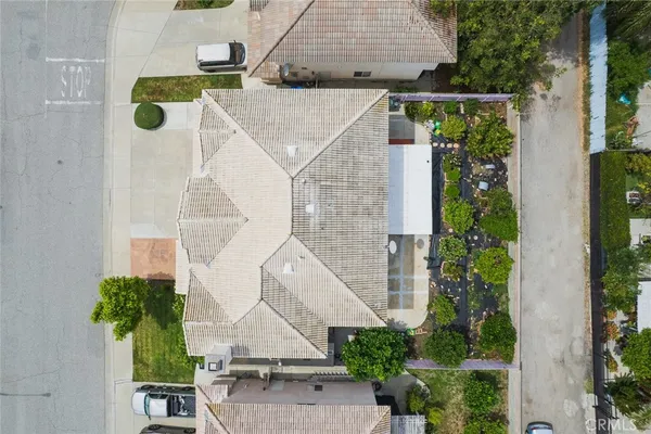 an aerial view of residential houses with outdoor space