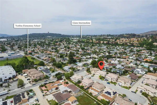 an aerial view of multiple house