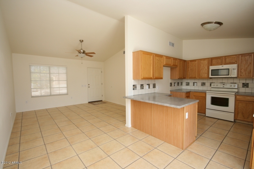 1742 East Sycamore Road Casa Grande, AZ 85122 - Photo 8 of 28 Kitchen and Living Room