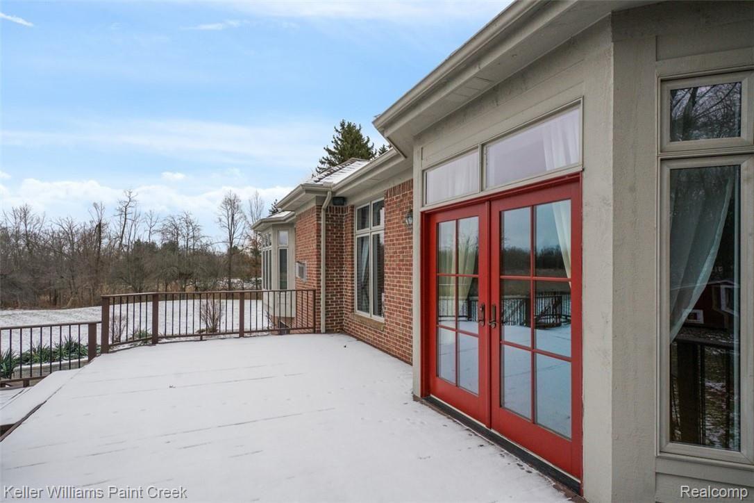 1400 Army Road Leonard, MI 48367 - Photo 10 of 56 Extra large deck off the Kitchen door wall.