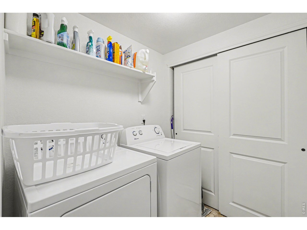 6603 West 3rd Street, Unit 1724 Greeley, CO 80634 - Photo 15 of 23 a utility room with dryer and washer