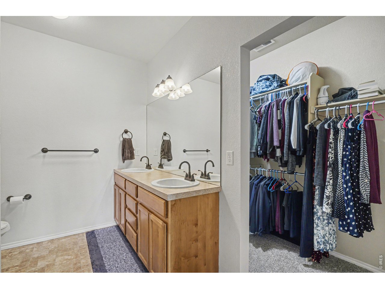 6603 West 3rd Street, Unit 1724 Greeley, CO 80634 - Photo 10 of 23 a view of a bathroom with a sink