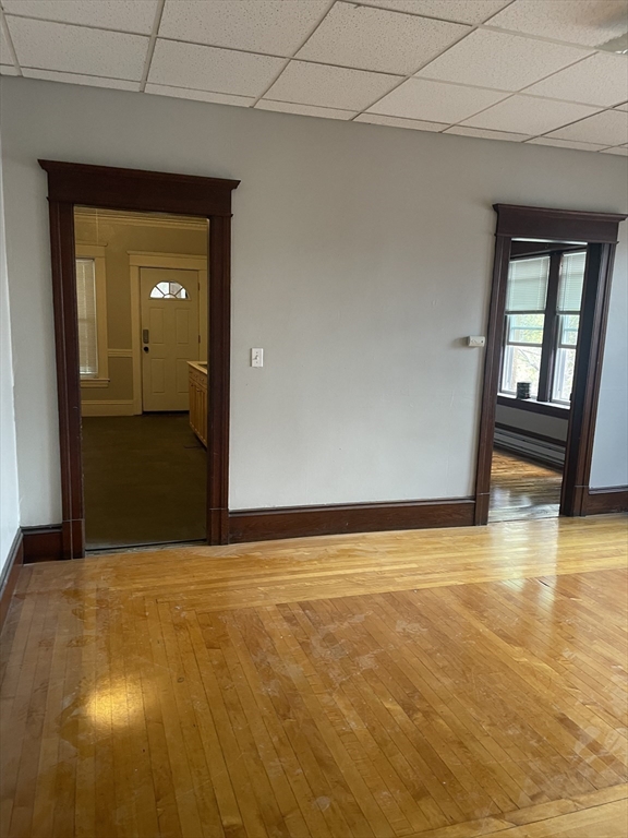 245 Sargeant Street, Unit 2 Holyoke, MA 01040 - Photo 9 of 9 a view of an empty room with glass door