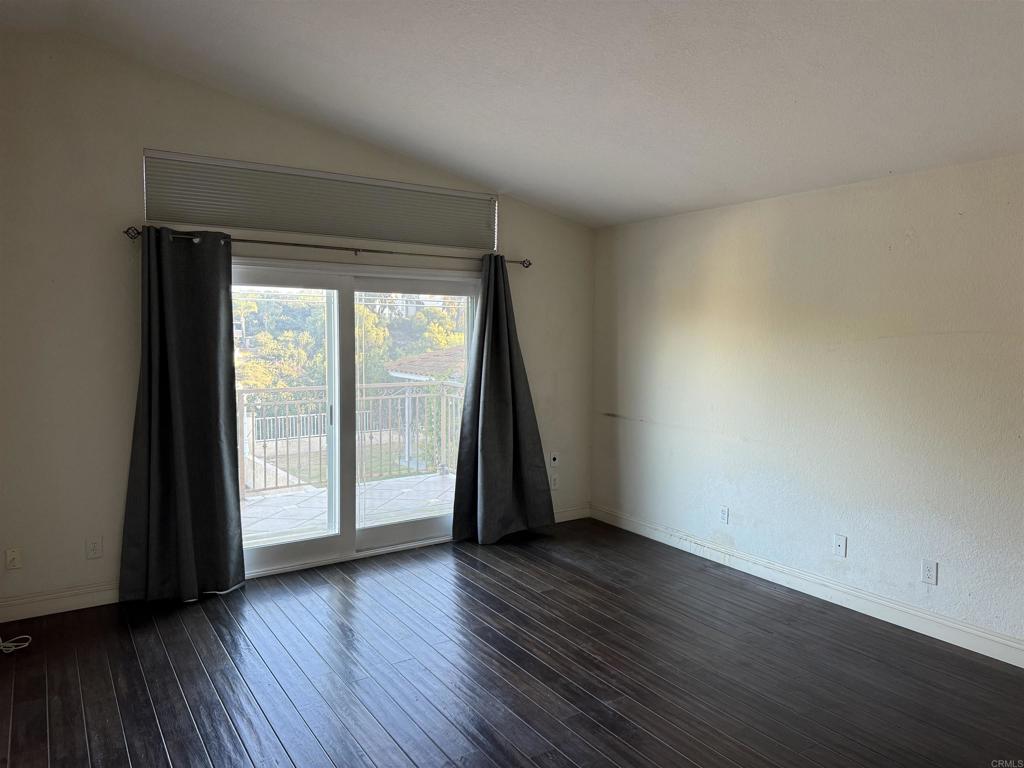 467 Cherry Hills Lane Bonita, CA 91902 - Photo 18 of 42 wooden floor in an empty room with a window