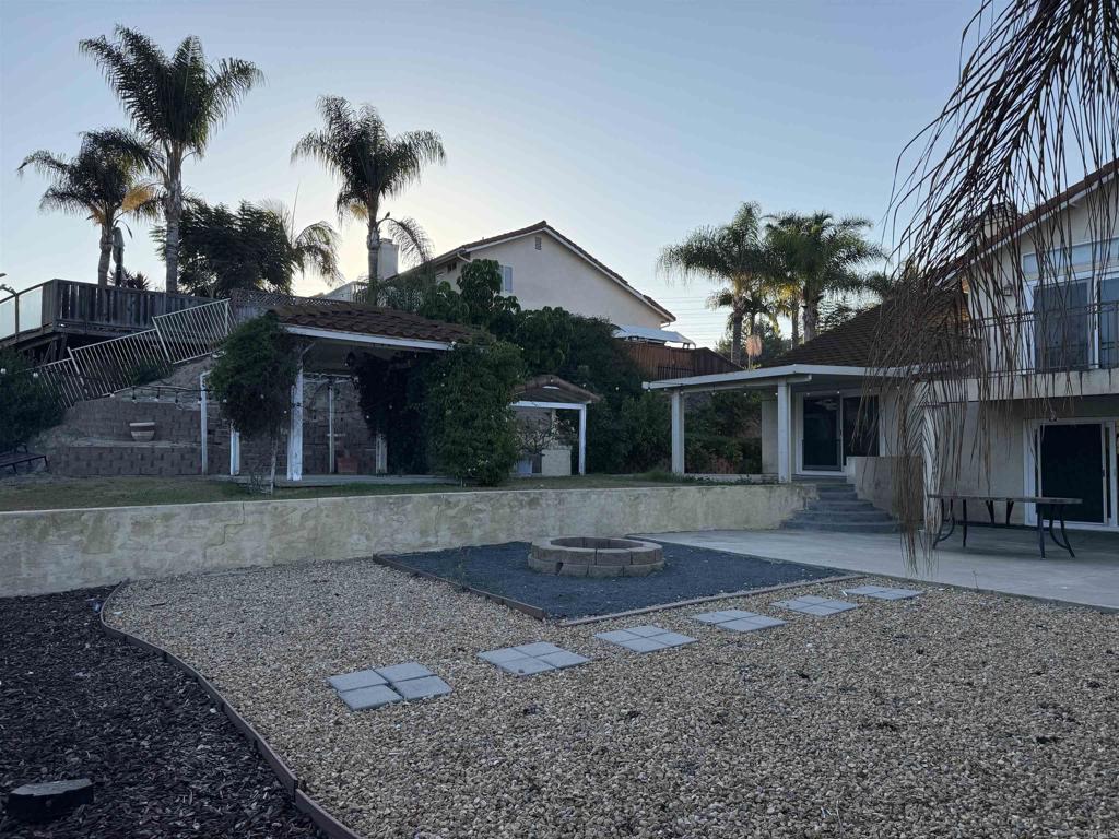 467 Cherry Hills Lane Bonita, CA 91902 - Photo 23 of 42 a front view of a house with garden