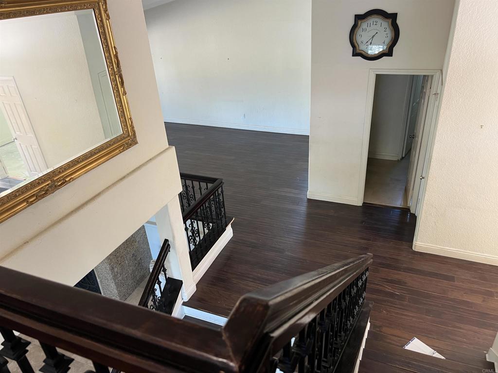 467 Cherry Hills Lane Bonita, CA 91902 - Photo 29 of 42 a view of an entryway with wooden floor