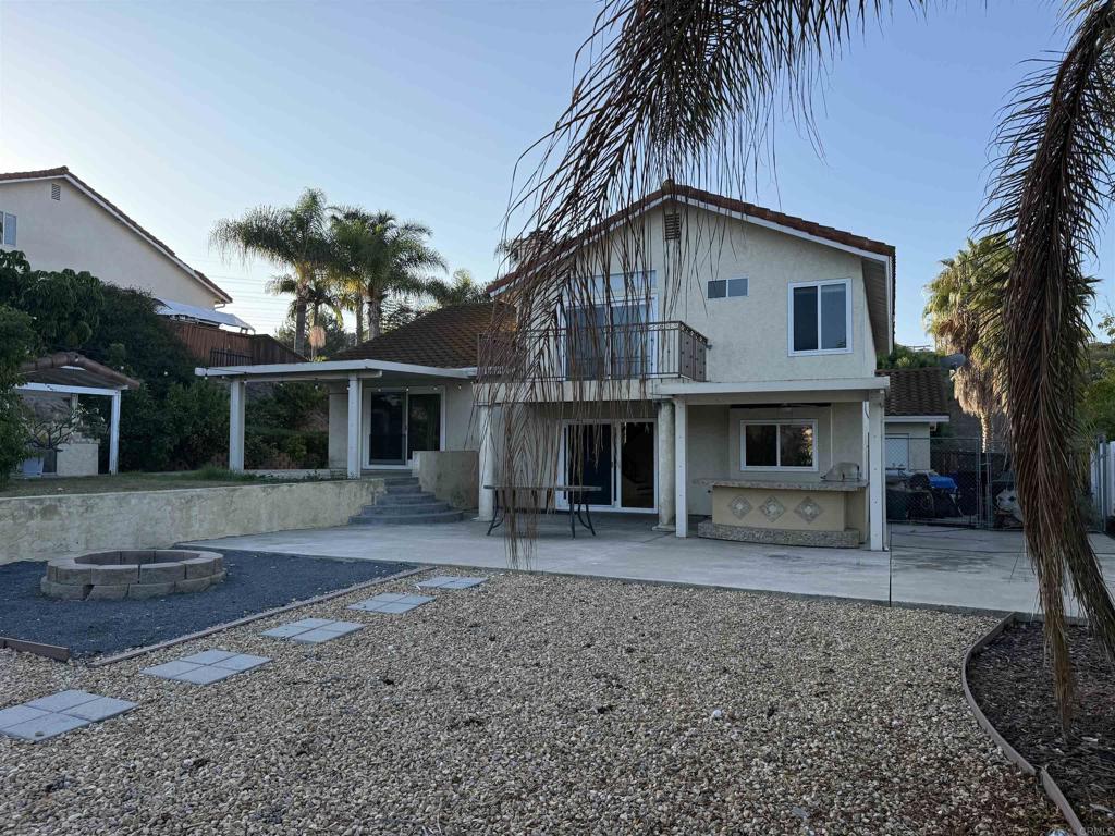 467 Cherry Hills Lane Bonita, CA 91902 - Photo 31 of 42 a front view of a house with garden