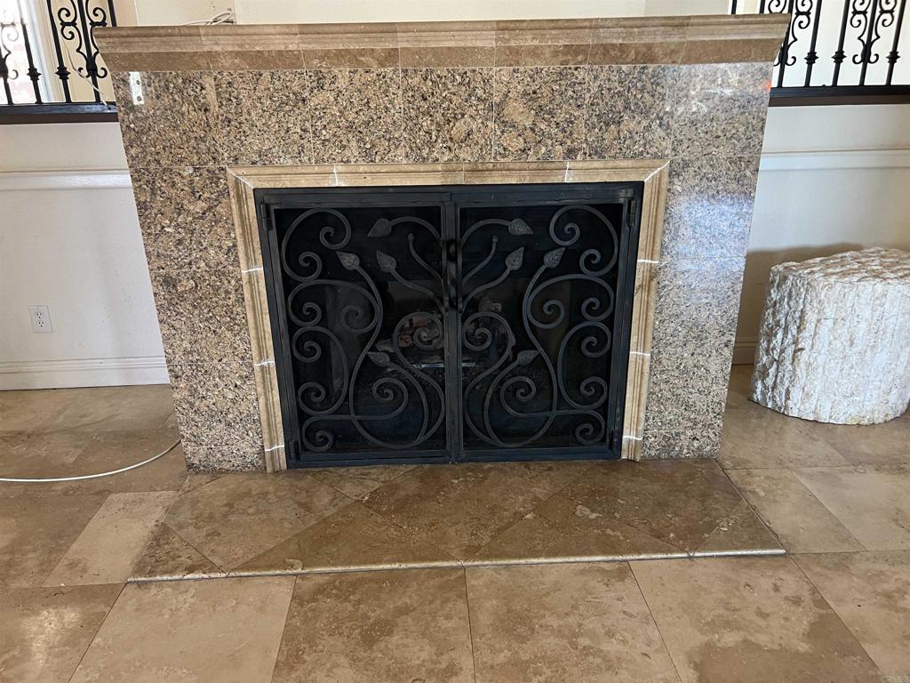 467 Cherry Hills Lane Bonita, CA 91902 - Photo 7 of 42 a close view of a fireplace in room