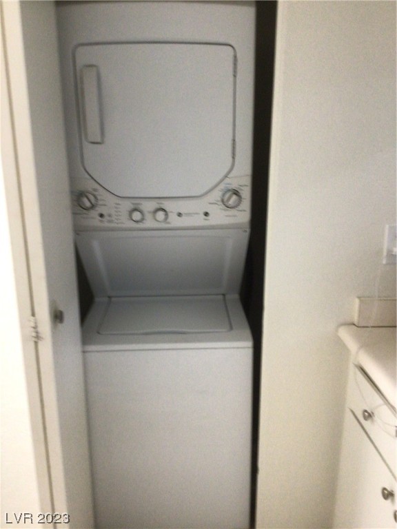 5737 Smoke Ranch Road, Unit B Las Vegas, NV 89108 - Photo 7 of 13 Stackable washer and dryer and hot water heater.
