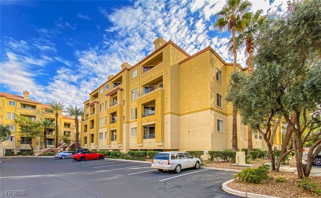 260 East Flamingo Road, Unit 229 Las Vegas, NV 89169 - Photo 6 of 31 View of apartment building / complex with uncovered parking