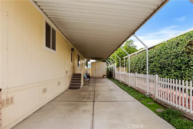 a view of swimming pool with outdoor seating