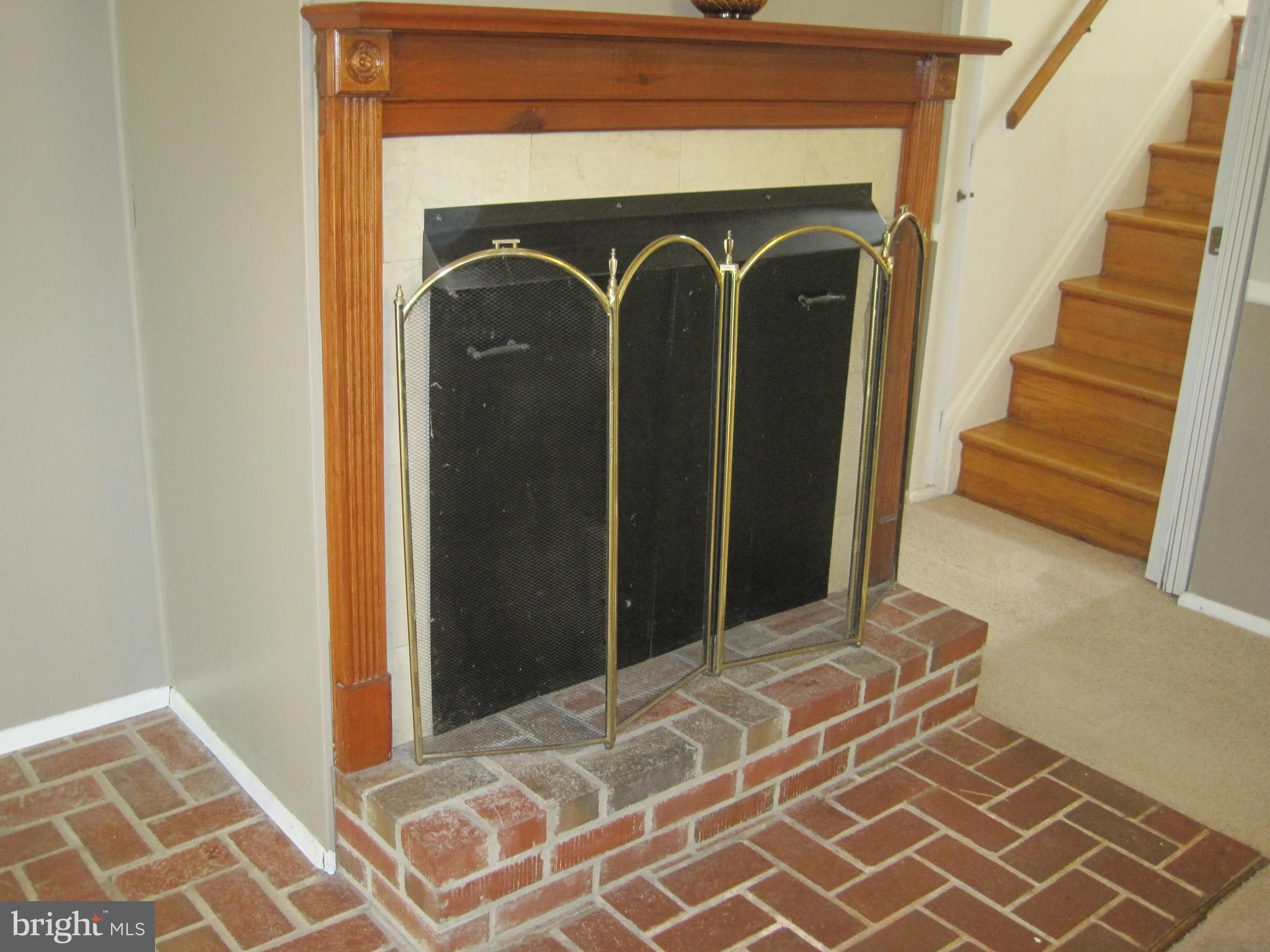 703 Falconer Road Joppa, MD 21085 - Photo 25 of 67 Woodburning Fireplace for Chilly Nights