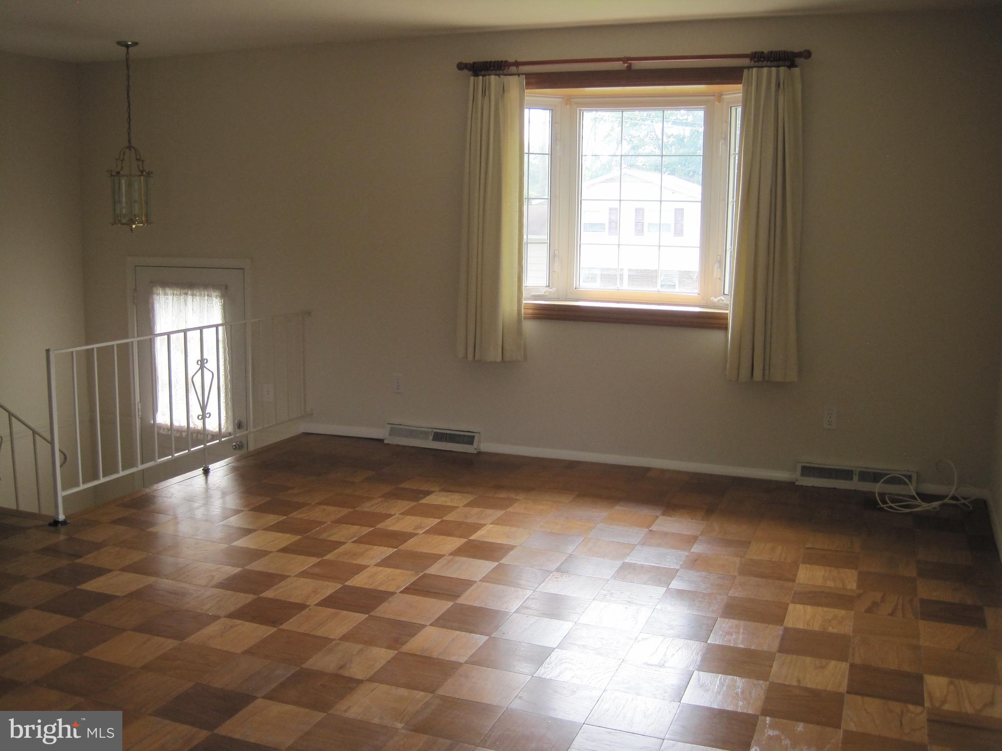 703 Falconer Road Joppa, MD 21085 - Photo 39 of 67 Living Room with Wood Flooring