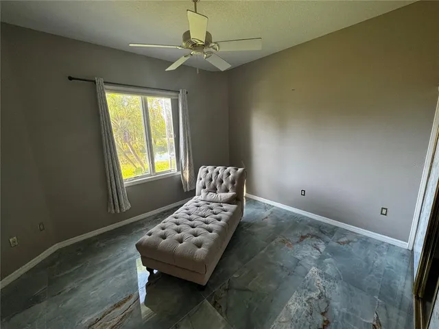 a view of empty room with windows