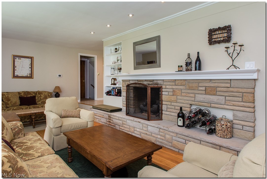 2987 Lander Road Pepper Pike, OH 44124 - Photo 10 of 33 Living room w/wood burning fireplace, built-in