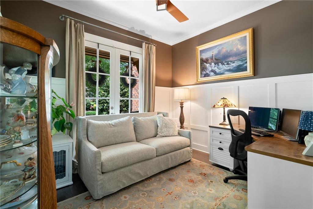 7240 Samples Field Road Cumming, GA 30040 - Photo 27 of 84 a living room with furniture and a flat screen tv