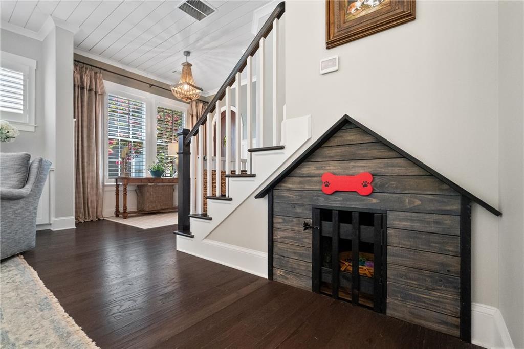 7240 Samples Field Road Cumming, GA 30040 - Photo 30 of 84 a view of entryway and hall with wooden floor