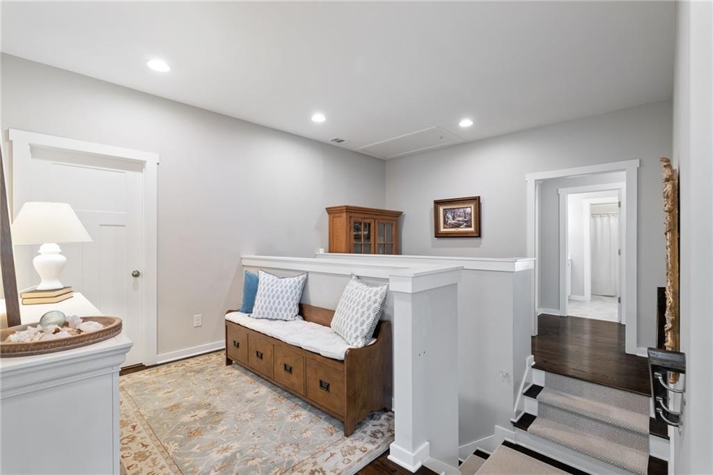 7240 Samples Field Road Cumming, GA 30040 - Photo 31 of 84 a living room with furniture and a table