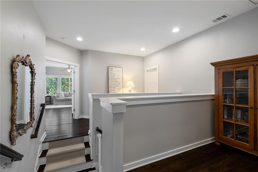 7240 Samples Field Road Cumming, GA 30040 - Photo 32 of 84 a view of a living room with furniture and a window