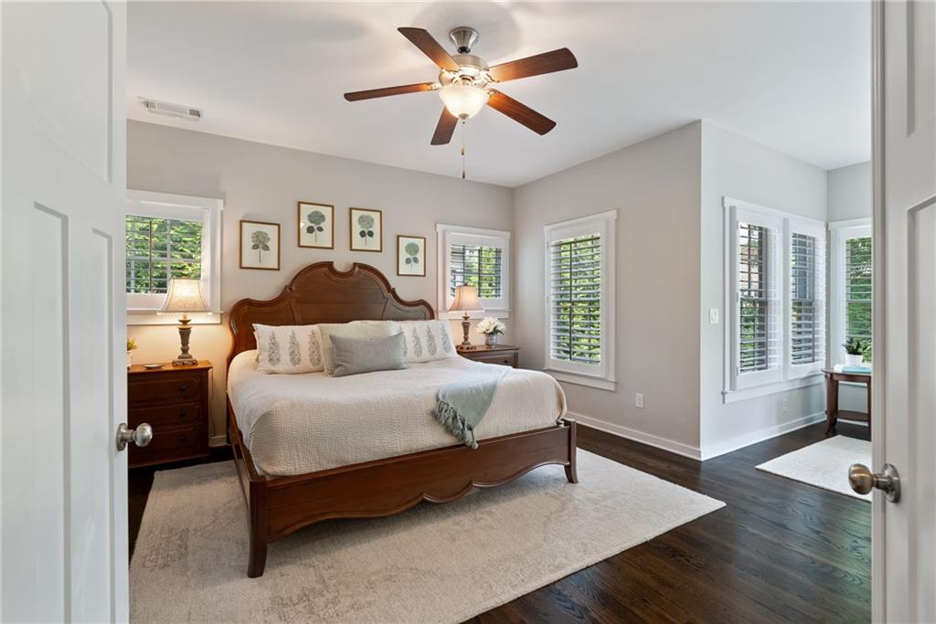 7240 Samples Field Road Cumming, GA 30040 - Photo 33 of 84 a spacious bedroom with a bed and a large window