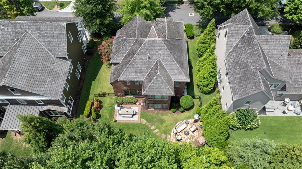 7240 Samples Field Road Cumming, GA 30040 - Photo 56 of 84 an aerial view of a house with garden space and street view