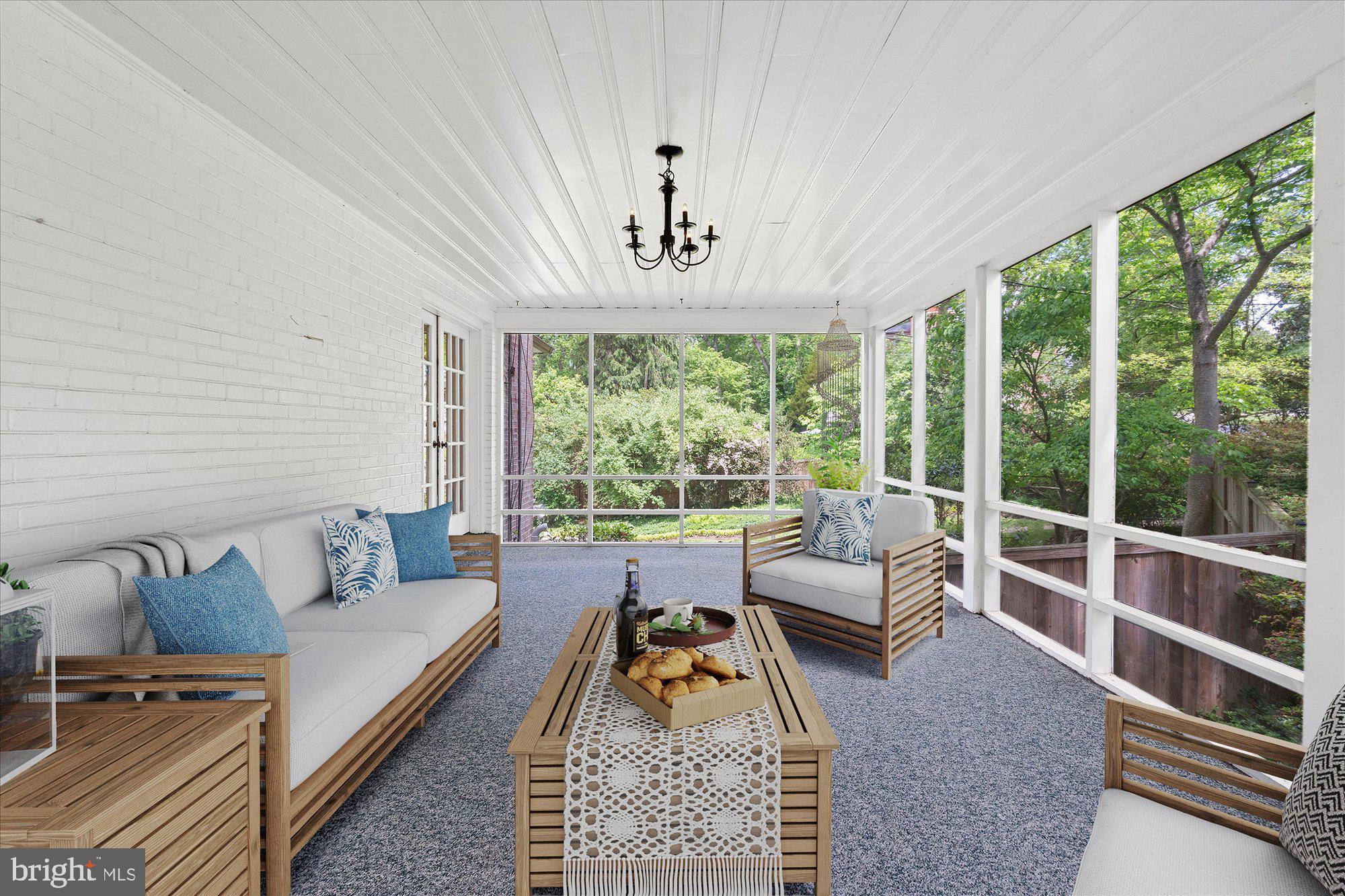 8300 Kerry Road Chevy Chase, MD 20815 - Photo 13 of 42 a living room with furniture and a large window