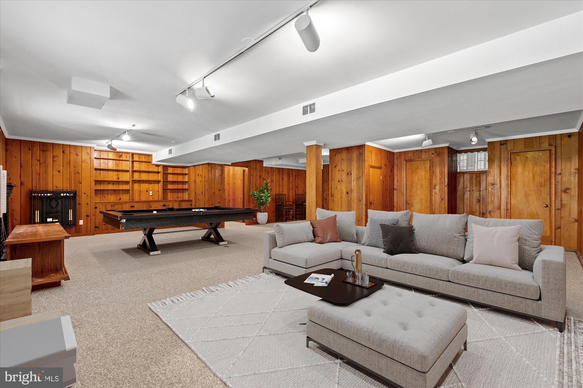 8300 Kerry Road Chevy Chase, MD 20815 - Photo 33 of 42 a living room with furniture and a large window