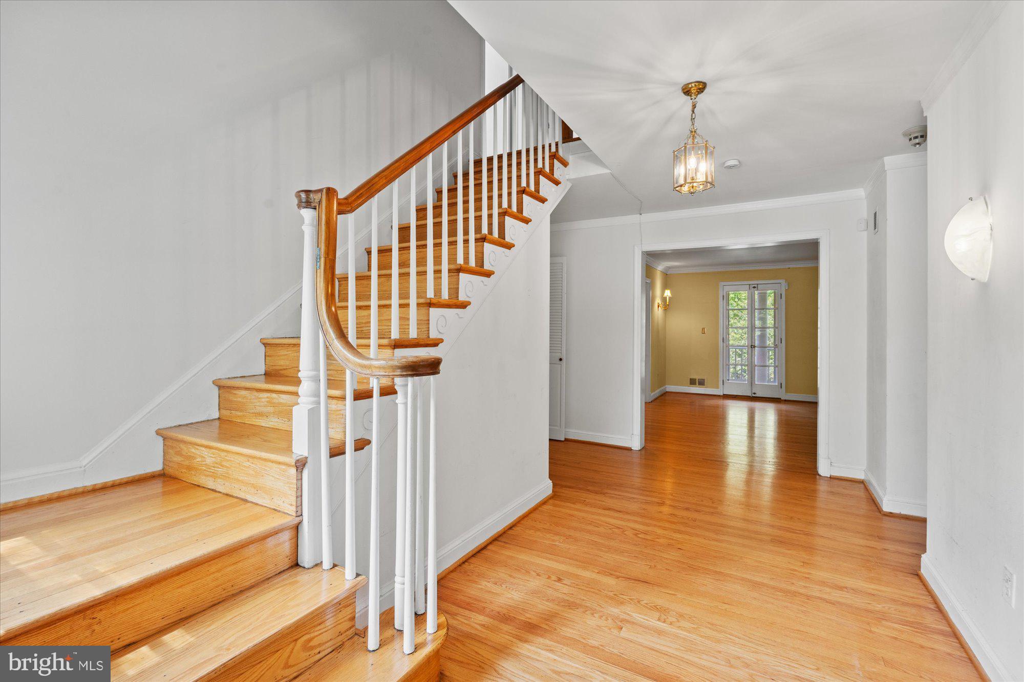 8300 Kerry Road Chevy Chase, MD 20815 - Photo 4 of 42 a view of entryway and hall with wooden floor
